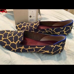 Rothy’s navy giraffe loafers in a size 10.5